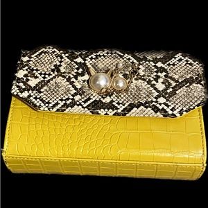 Yellow snake skin clutch with detachable chain strap